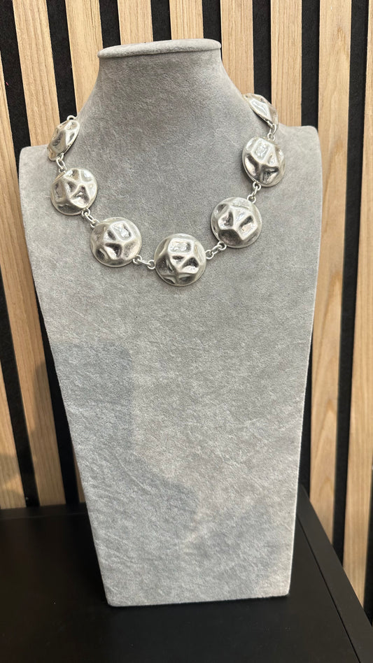 Collana tondi stilizzati
